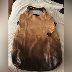 THE SAK brown and tan leather w/shoulder straps and shorter straps.. Not New..